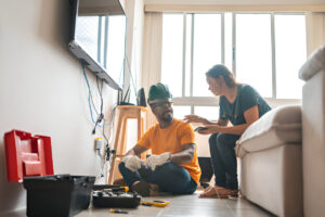 Electrical Technician with a lady client